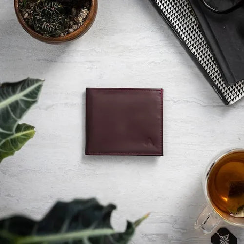 Photo is of an Allett wallet on a table. Allett makes designer wallets that are ultra slim for a low pocket profile.