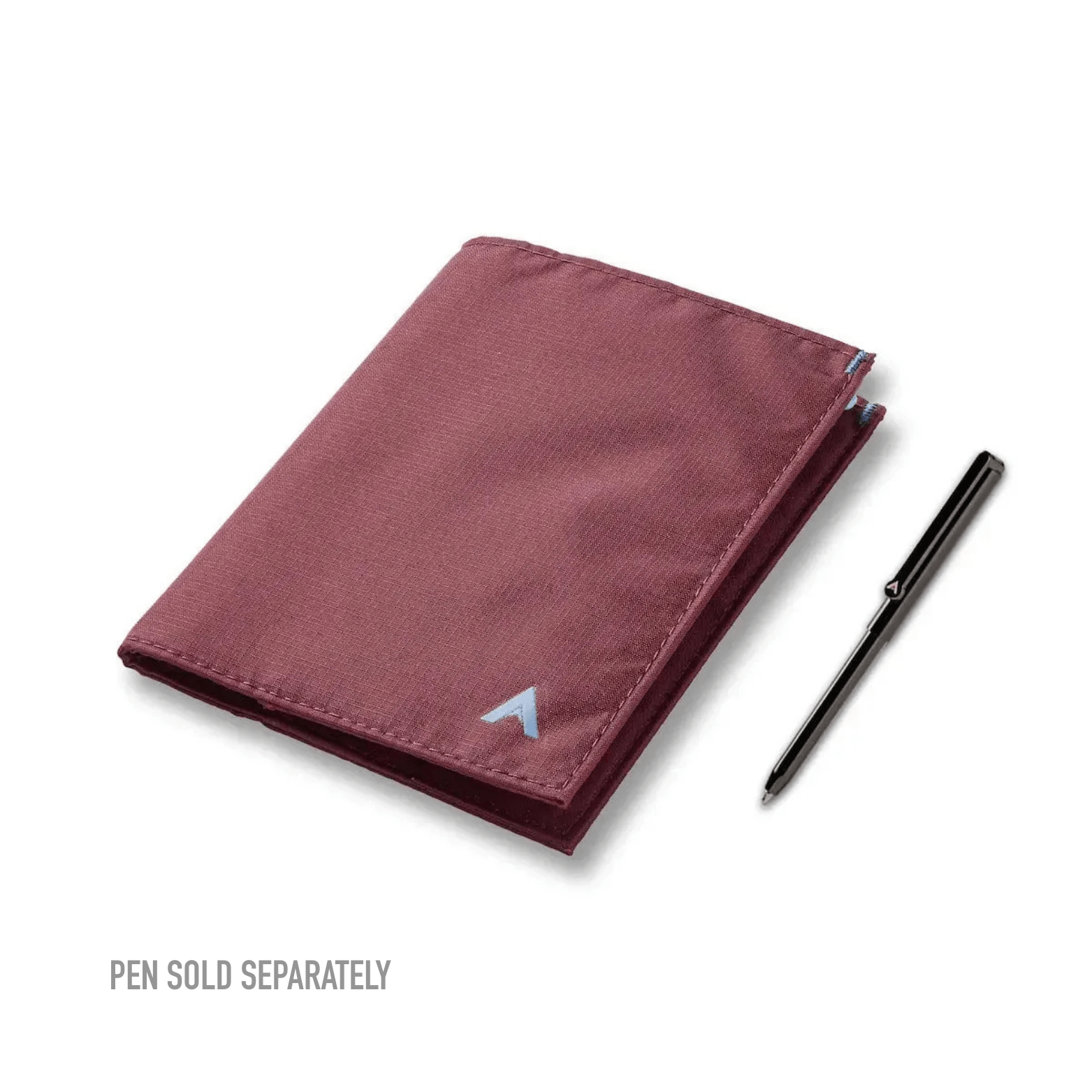Allett's The Original wallet next to a micropen that fits within the wallet, in its own special pocket mulberry pen