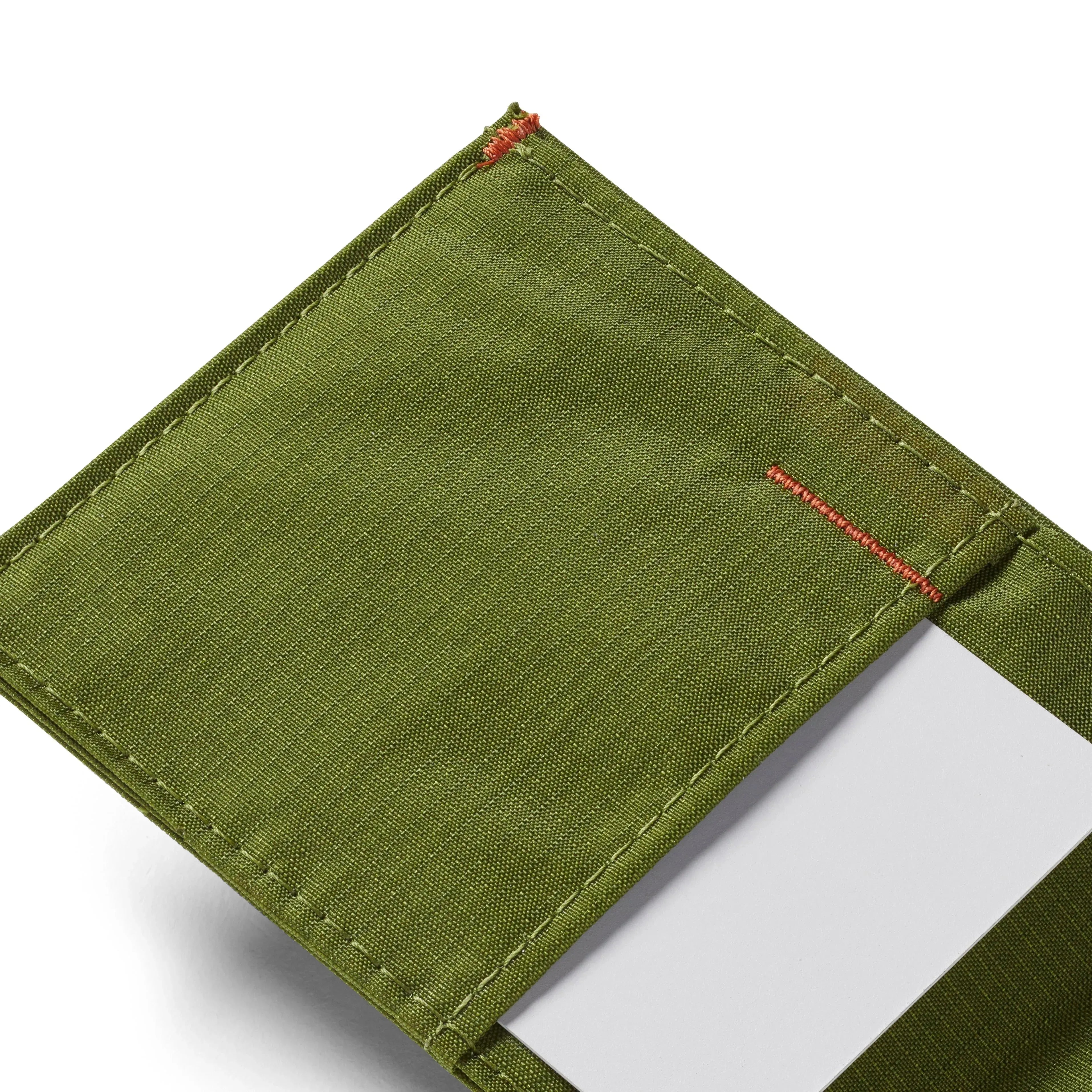 Close up of the stitching pattern front pocket wallet cala-green