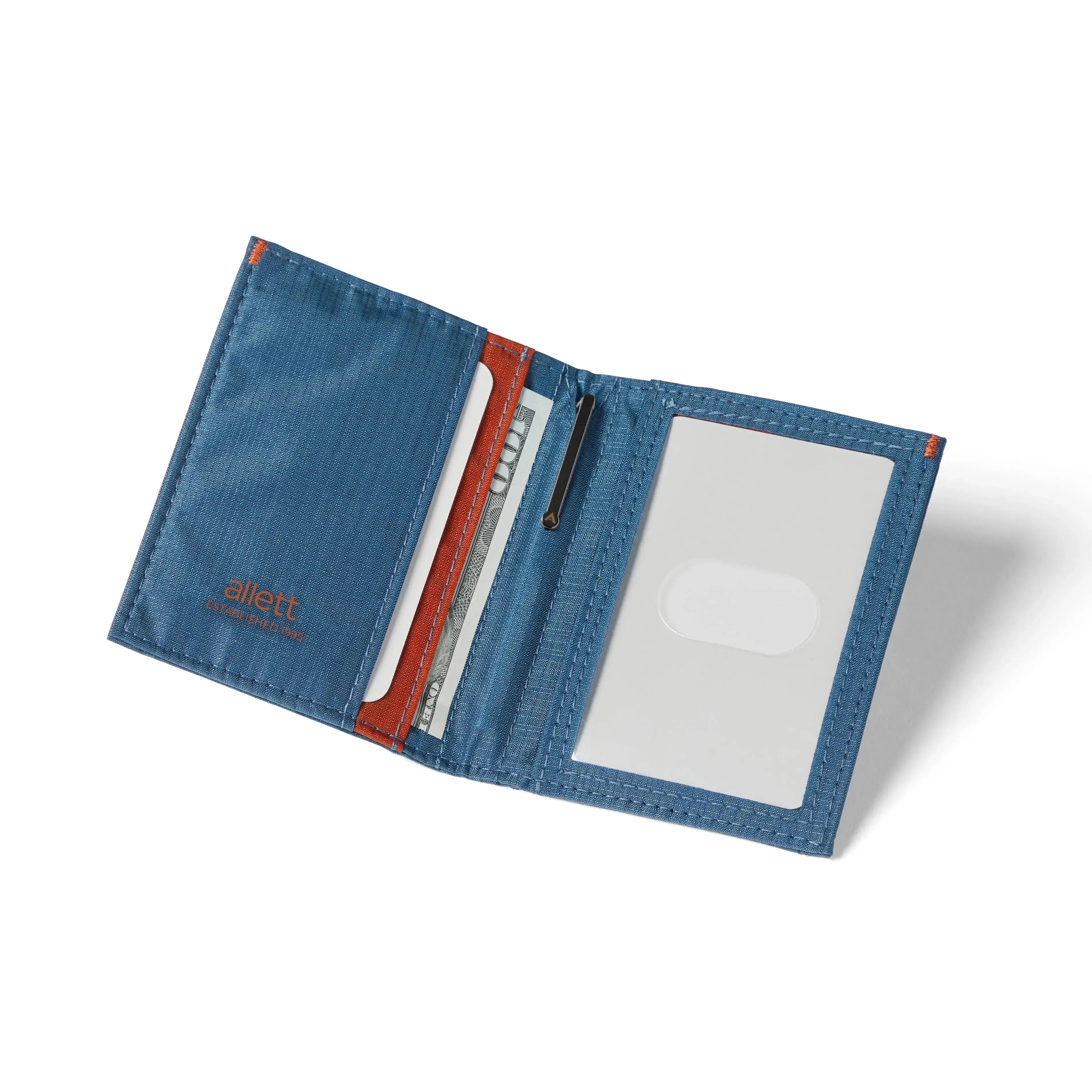 Open view of the Indigo Blue hybrid card wallet, featuring an RFID block and created from vegan nylon, exhibiting its card spaces and ID window. Allett Hybrid Card Wallet indigo-blue