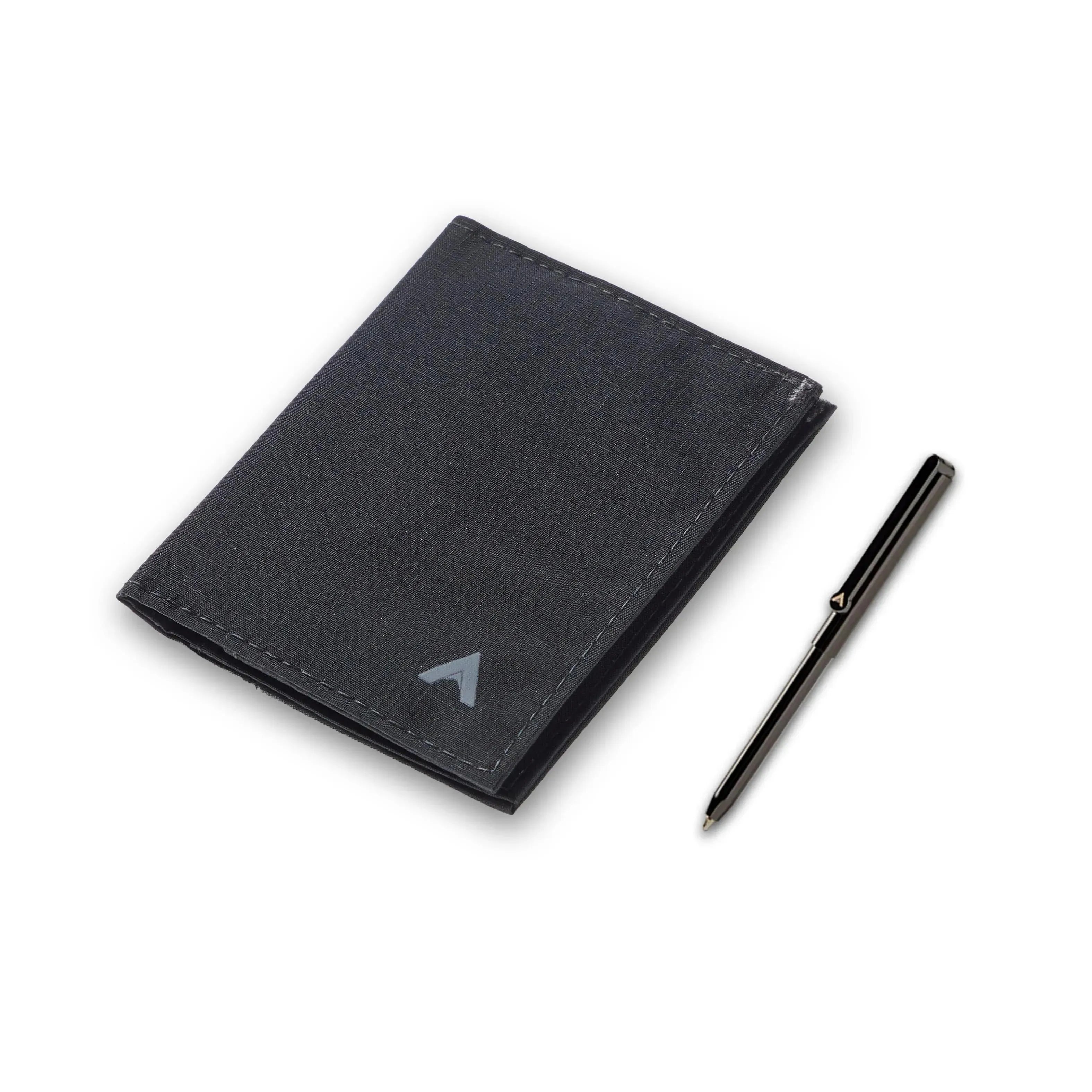 Size demonstration of Allett's sleek Jet Black hybrid card wallet placed next to a micro pen. Allett Hybrid Card Wallet jet-black pen