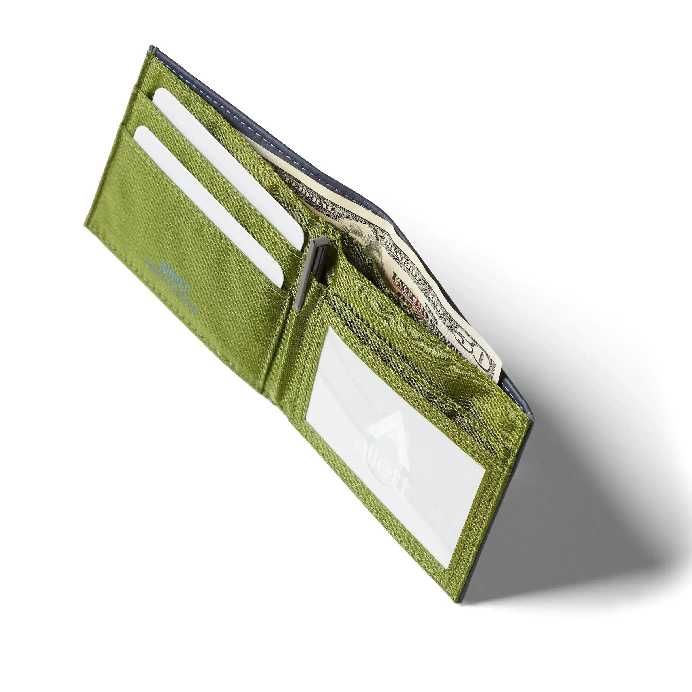 Open midnight blue leather ID wallet with a light green nylon interior open to show the ID pocket. Allett id wallet leather midnight-blue