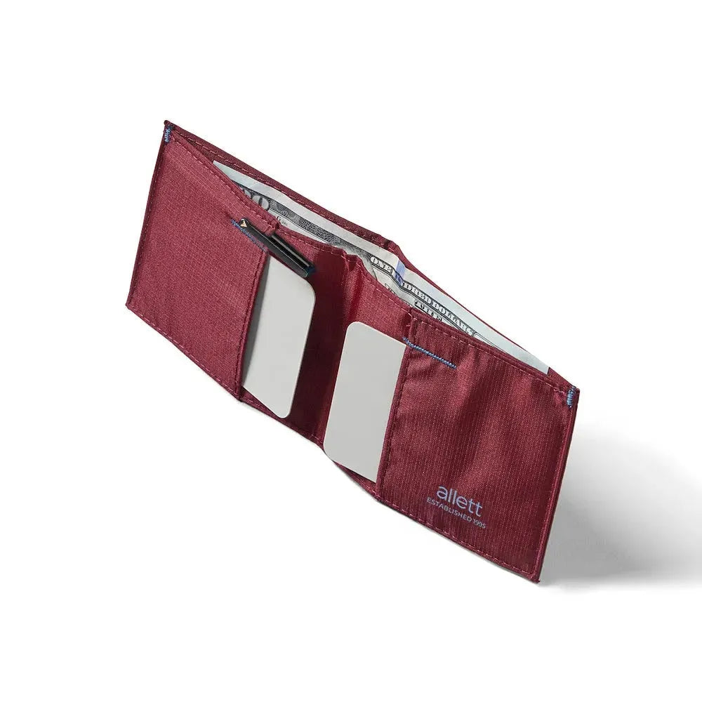 Open sport wallet showcasing how the wallet holds cards. Wallet is made in vegan ripstop nylon in mulberry color -Allett Sport Wallet RFID Nylon Front Pocket Wallet mulberry