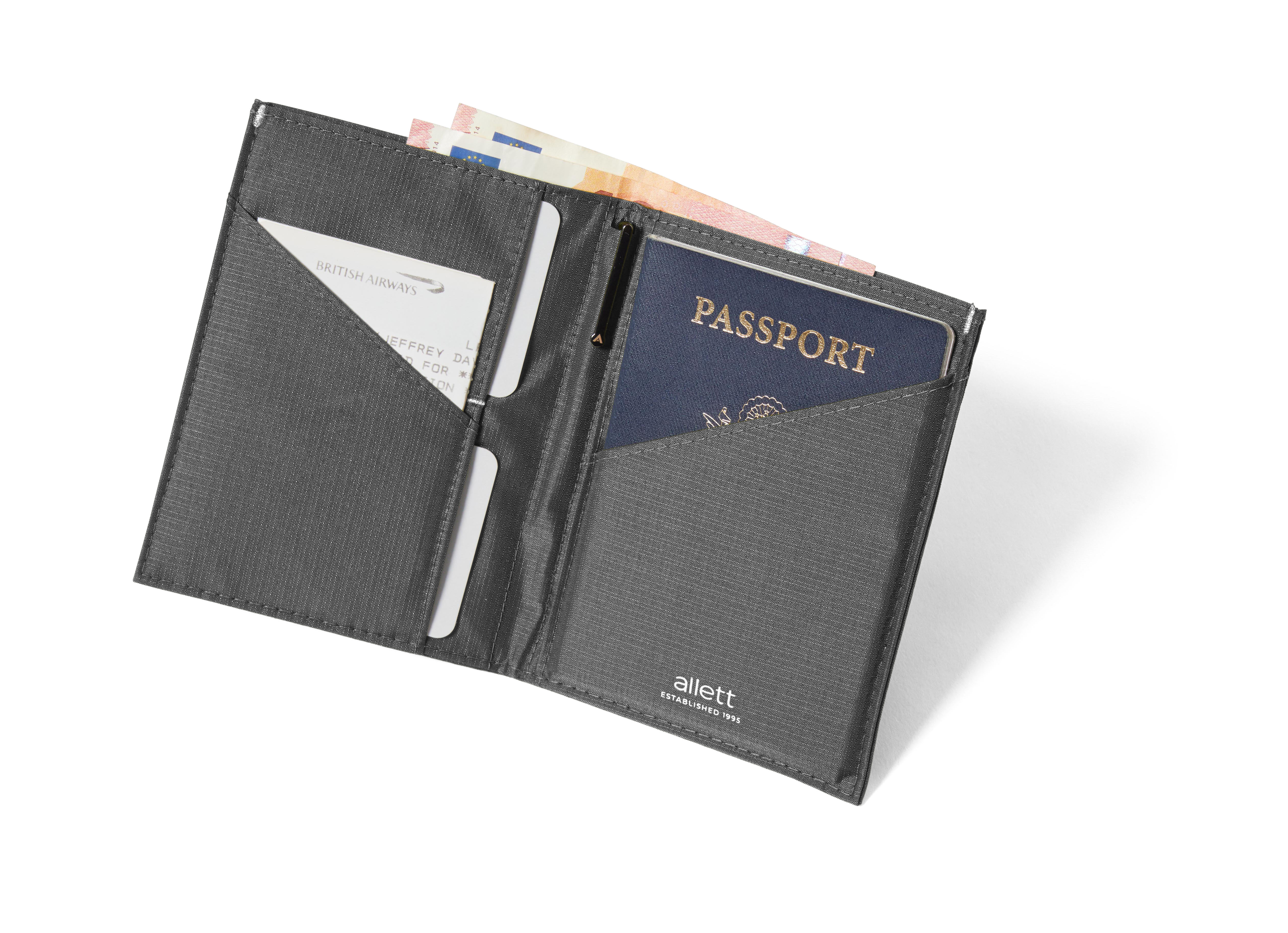 Black travel wallet with passport and card slots on a white background