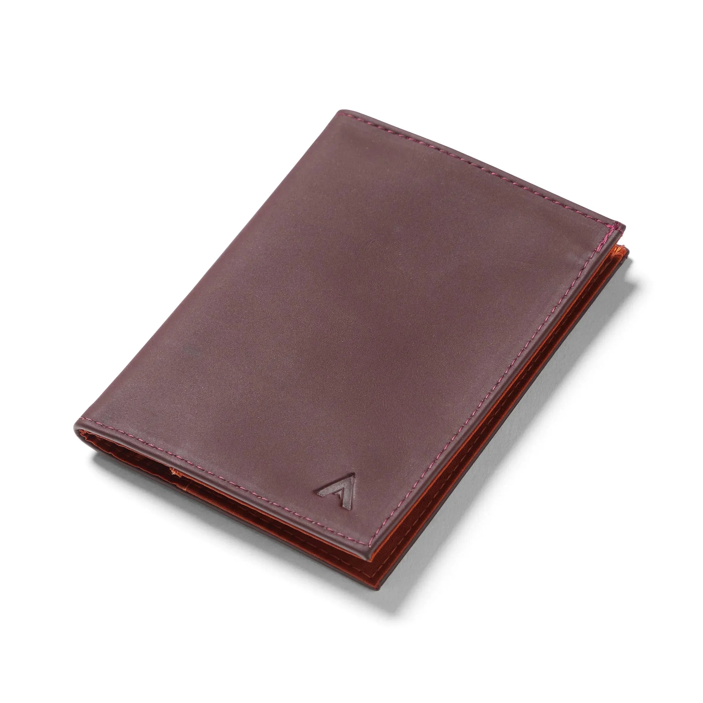 Merlot colored premium ultra thin leather wallet laying flat against a white background. Allett leather original wallet merlot