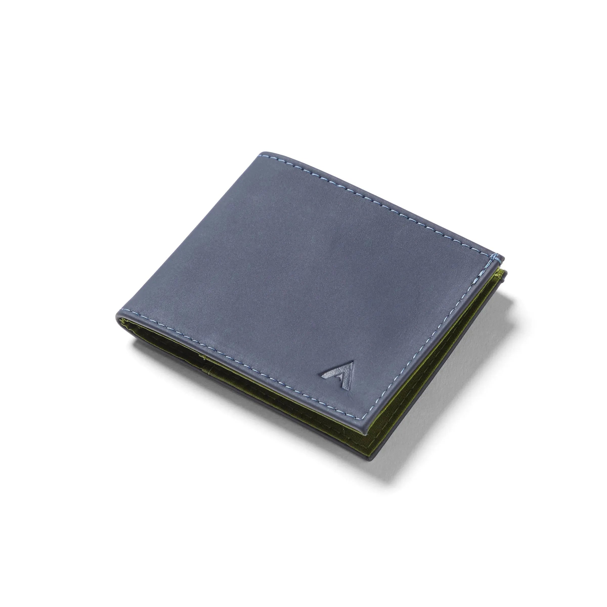 Allett's midnight blue colored RFID sports wallet, fashioned from leather, captured closed against a pure white background. Allett leather sport wallet midnight-blue