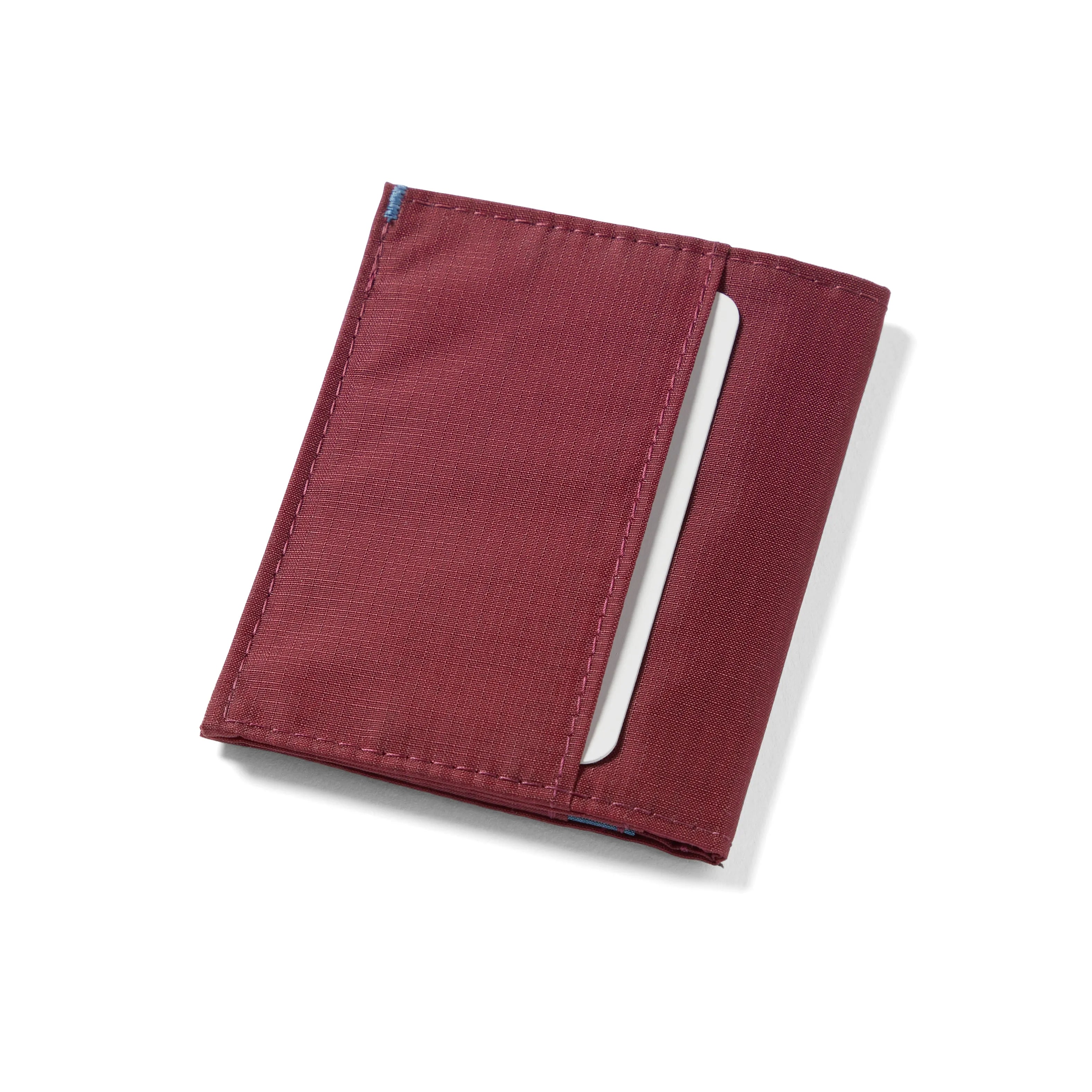 Hybrid card wallet in Mulberry, displaying an exterior pocket suitable for storing cards and folded currency. Allett Hybrid Card Wallet mulberry