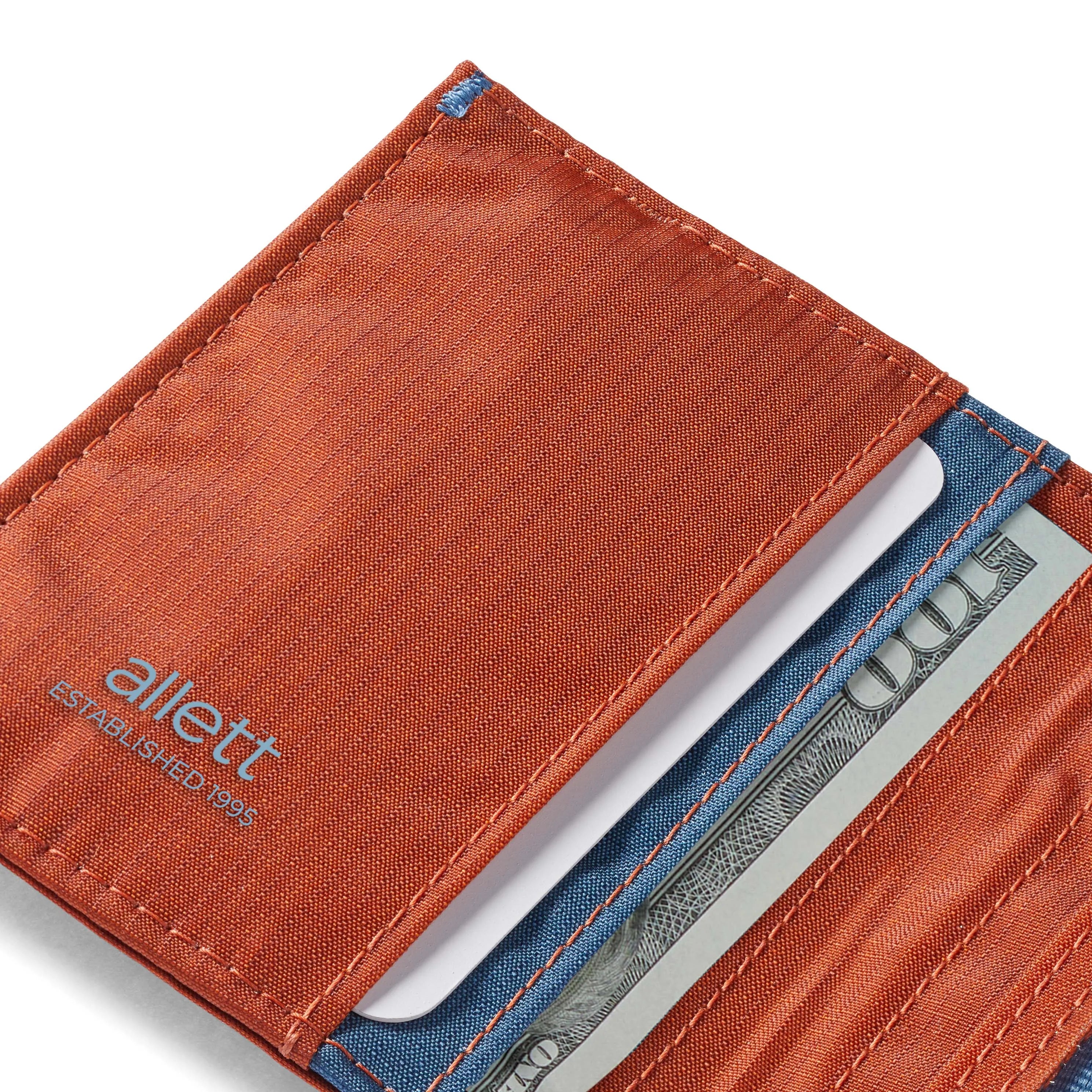Section of the potters clay Allett nylon hybrid card wallet showing the card holder pocket and switch-work. Allett Hybrid Card Wallet potters-clay