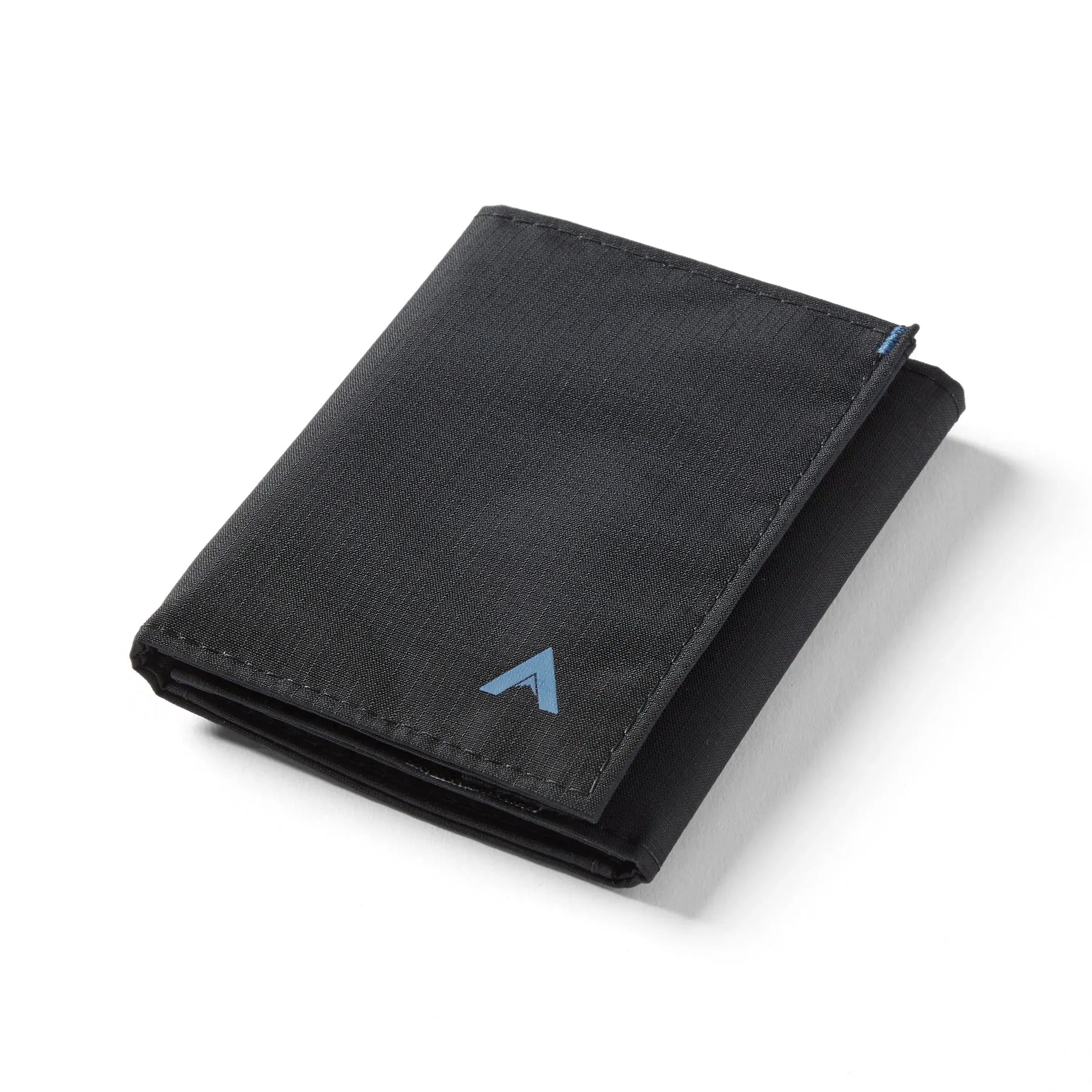 Jet black vegan nylon trifold wallet sitting closed against a white background. Allett Trifold Wallet nylon edition - jet-black