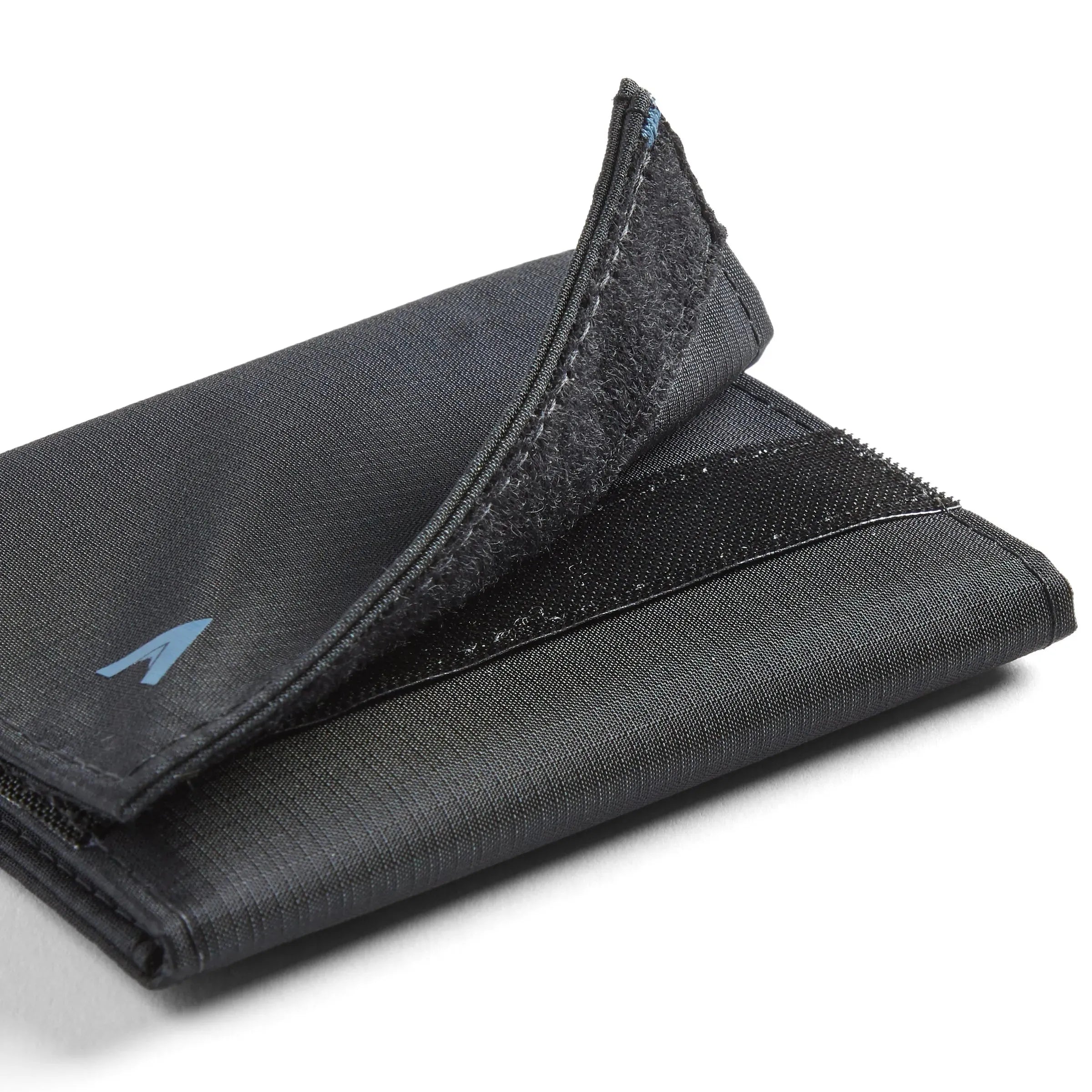 Jet black nylon trifold wallet with the velcro flap halfway open, slightly close up against a white background. Allett Trifold Wallet nylon edition - jet-black