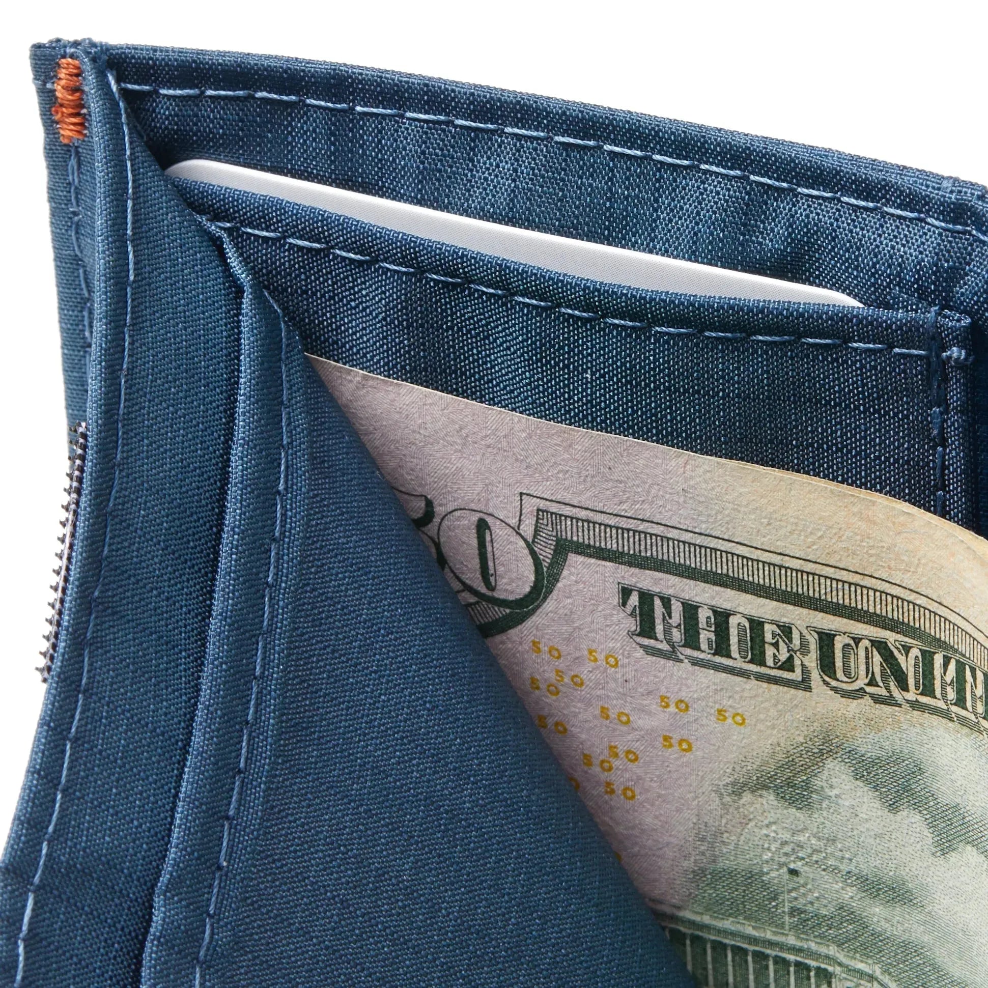 In-depth glimpse of the concealed inner card holder inside the spacious cash section of the vegan nylon trifold wallet in indigo blue. Allett Trifold Wallet nylon edition - indigo-blue