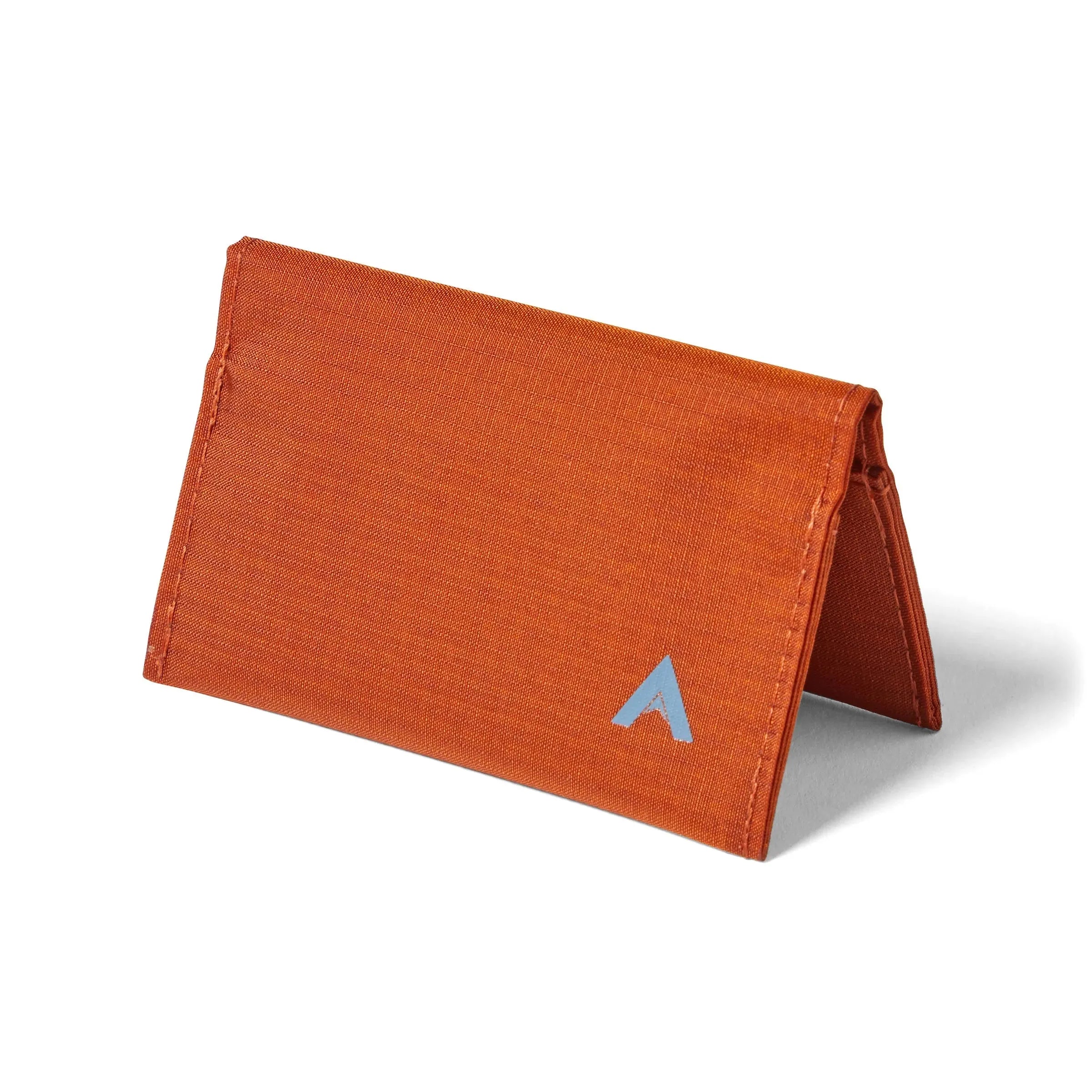 Allett's slimline potters clay vegan nylon card wallet, situated in a pyramid form on a white platform, illustrating its slim stature.- potters-clay