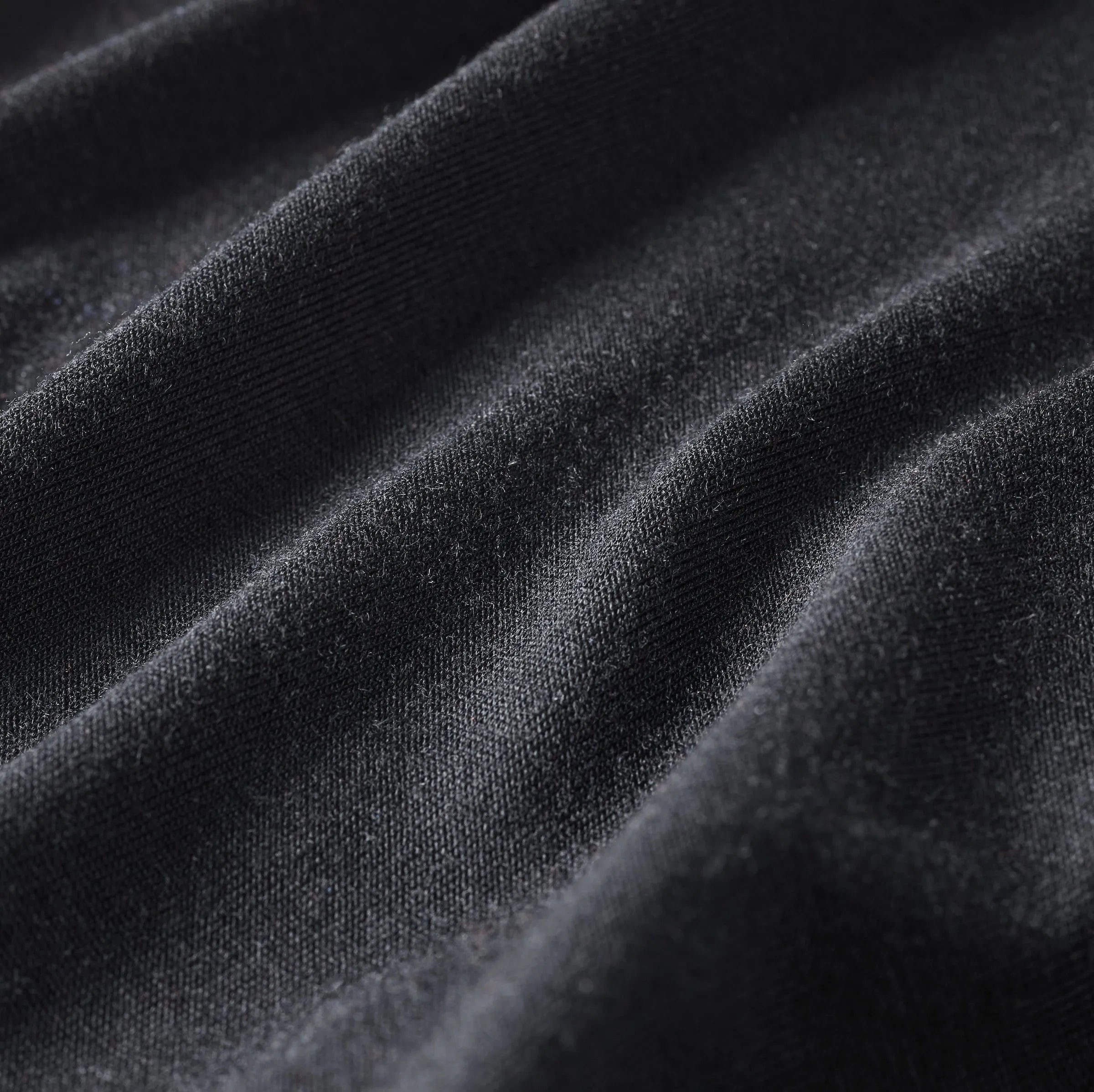 Close up fabric image showing a black Beechwood fabric. It is a concept image. black