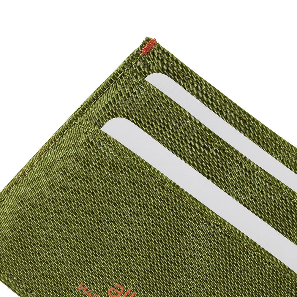 Close up of the corner of a cala green premium ID wallet to show the stitch work and quality. Allett ID Wallet Nylon RFID cala-green