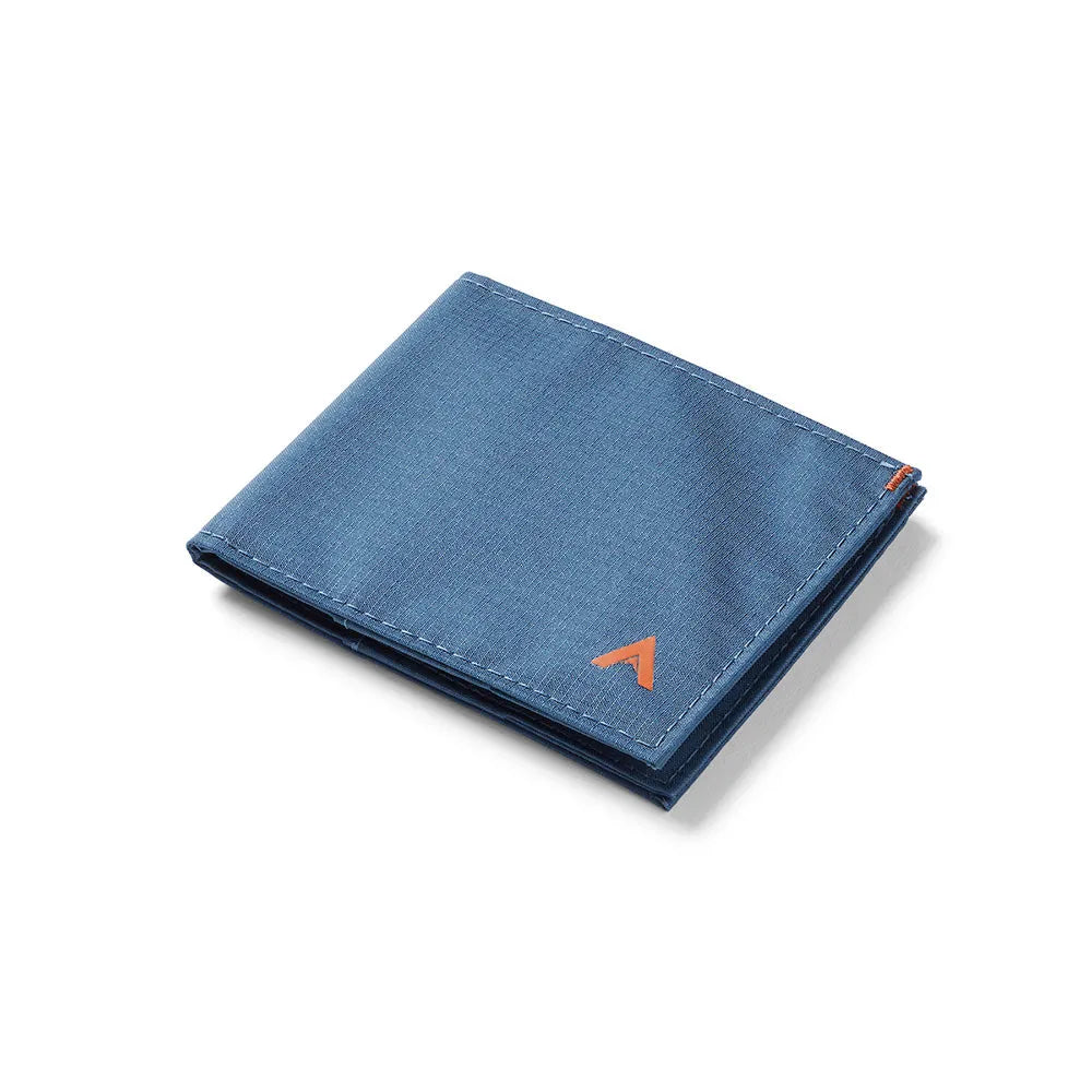 Compact RFID-blocking sport wallet designed for front pockets, featuring an indigo blue design and durable nylon construction -Allett Sport Wallet RFID Nylon Front Pocket Wallet indigo-blue