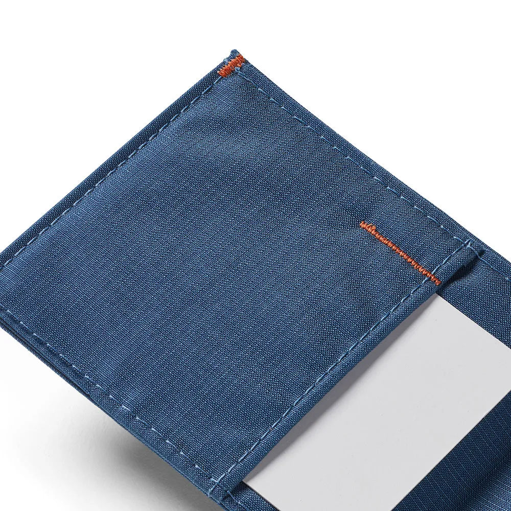 Close-up of the intricate stitching pattern on the sport wallet made of indigo blue nylon.Allett Sport Wallet RFID Nylon Front Pocket Wallet indigo-blue