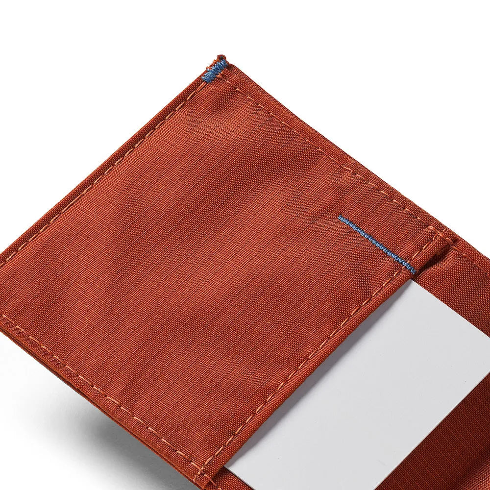 Close-up of the intricate stitching pattern on the potters clay nylon sport wallet, showcasing its meticulous craftsmanship - Allett Sport Wallet RFID Nylon Front Pocket Wallet potters-clay
