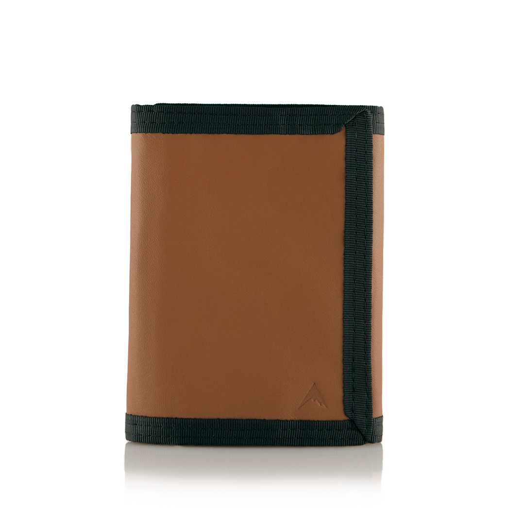 Brown leather with trim "Switchback" trifold wallet, closed, and positioned against a white background. Allett Switchback Leather Wallet - brown