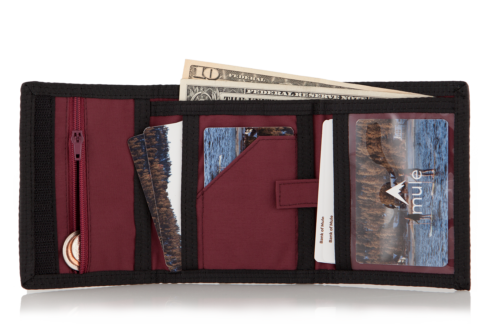 Open oxblood leather "Switchback" trifold wallet, displaying three distinct sections with cards to the left, a pull tab for hidden cards, and an ID slot on the right. Allett Switchback Leather Wallet - oxblood