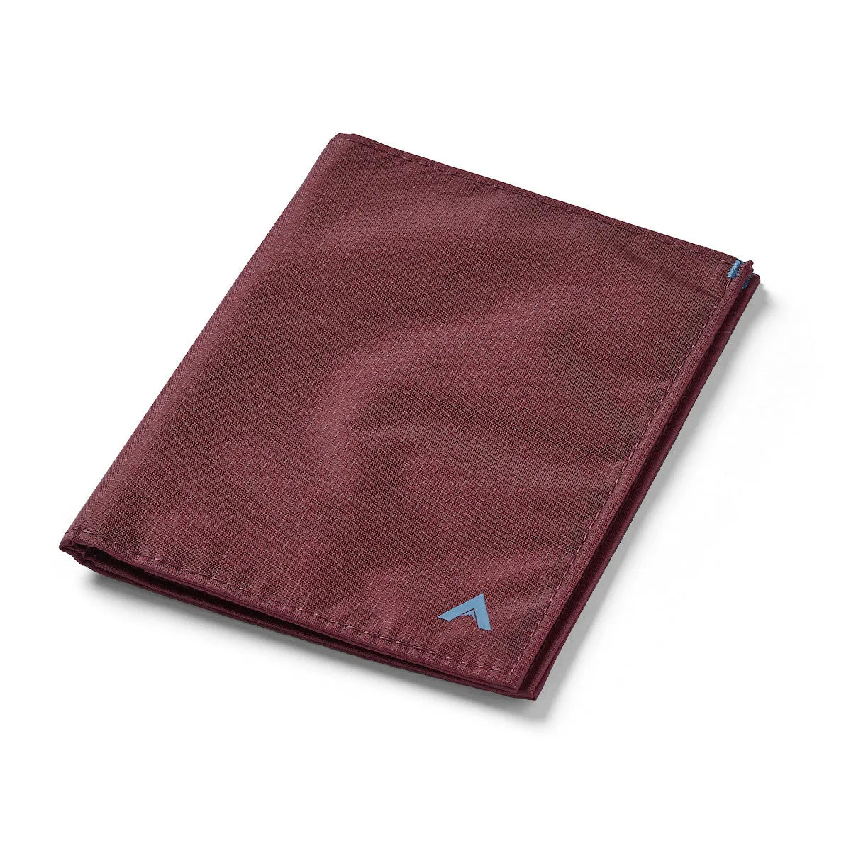 Closed RFID wallet crafted in mulberry ripstop nylon from Allett, laying flat atop a white surface, and highlighting the logo in the lower right section. Allett Travel Wallet RFID Nylon - mulberry