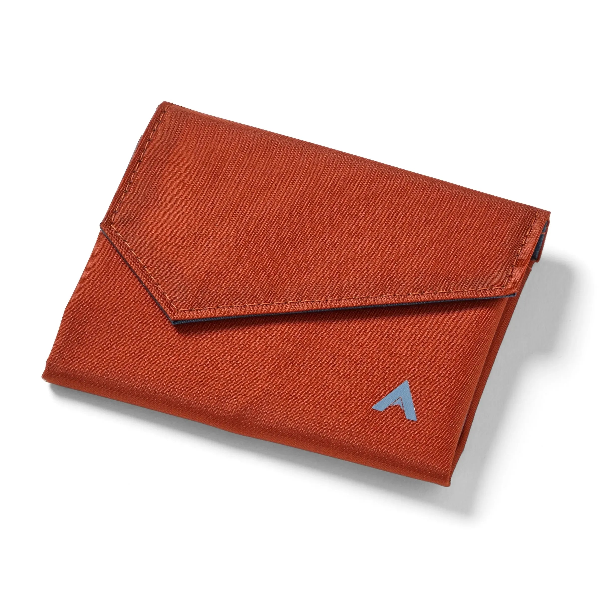 Closed potter's clay nylon accordion wallet by Allett, set against a white background, highlighting the logo in the bottom right and a distinctive, angular front flap. Allett Accordion Wallet in RFID Blocking Nylon potters-clay