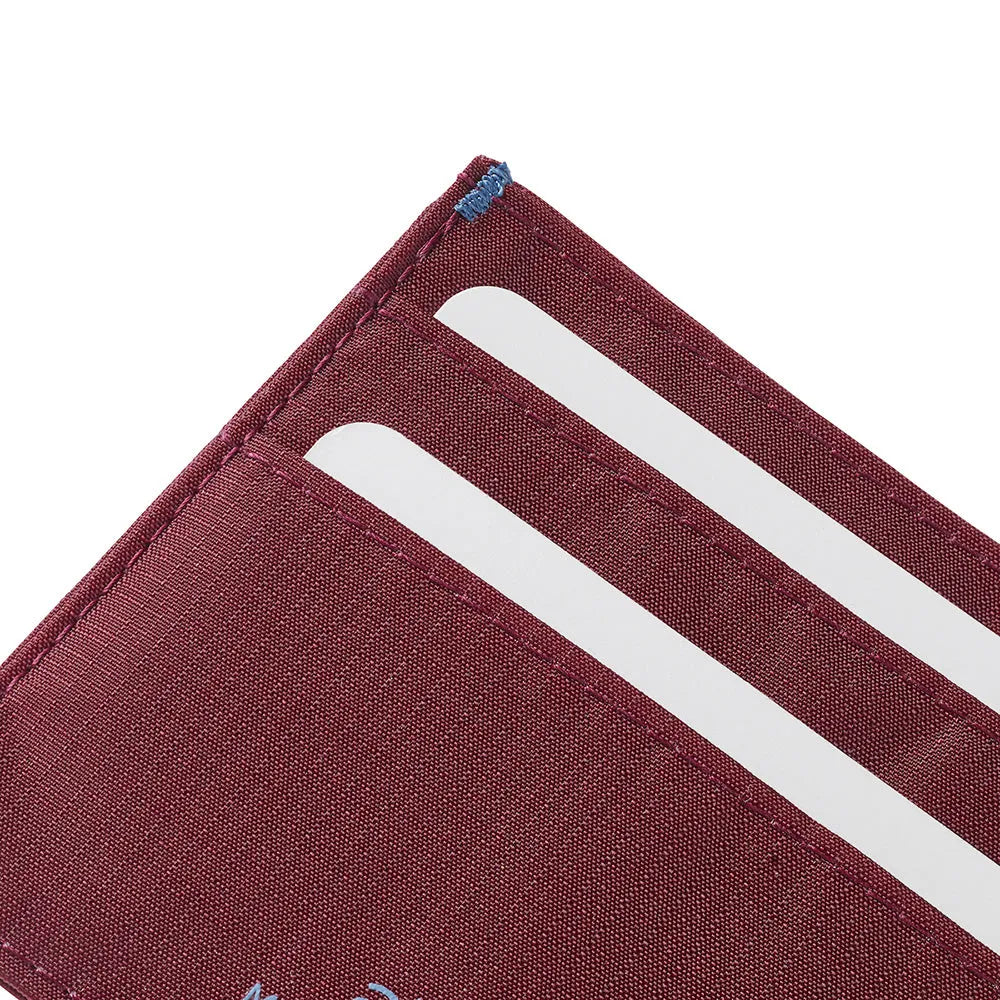 RFID blocking ID nylon wallet from Allett made in Mulberry color nylon - close up of the corner to show the quality stitching -Allett ID Wallet Nylon RFID mulberry