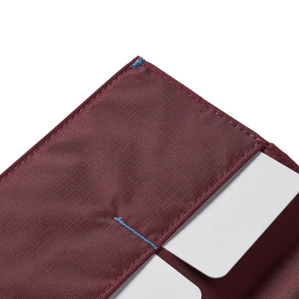 Details of the inside of the The Original wallet in nylon, made with premium materials for a long lasting carry mulberry