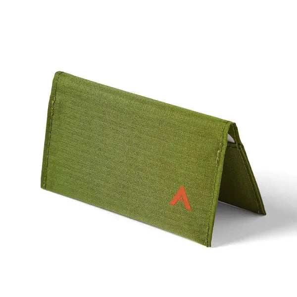 Allett's vegan nylon card wallet in cala green laying pyramid on a white surface to show its slim size. - cala-green