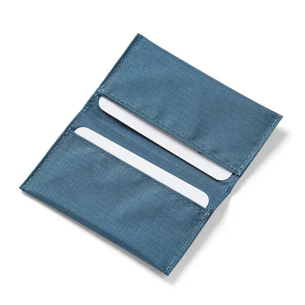Unfurled perspective of the incredibly thin vegan card wallet in indigo blue, crafted from tear-resistant nylon by Allett. - indigo-blue