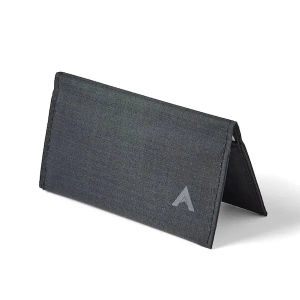 Jet black vegan nylon card wallet from Allett, perched in a pyramidal shape against a white field, demonstrating its slimline profile - jet-black