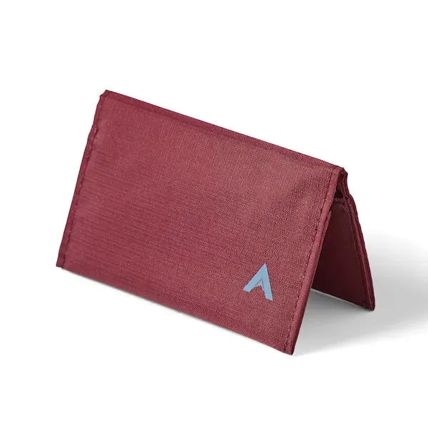 Allett's mulberry vegan nylon card wallet, set pyramid-style on a pure white setting to underscore its lean size - mulberry